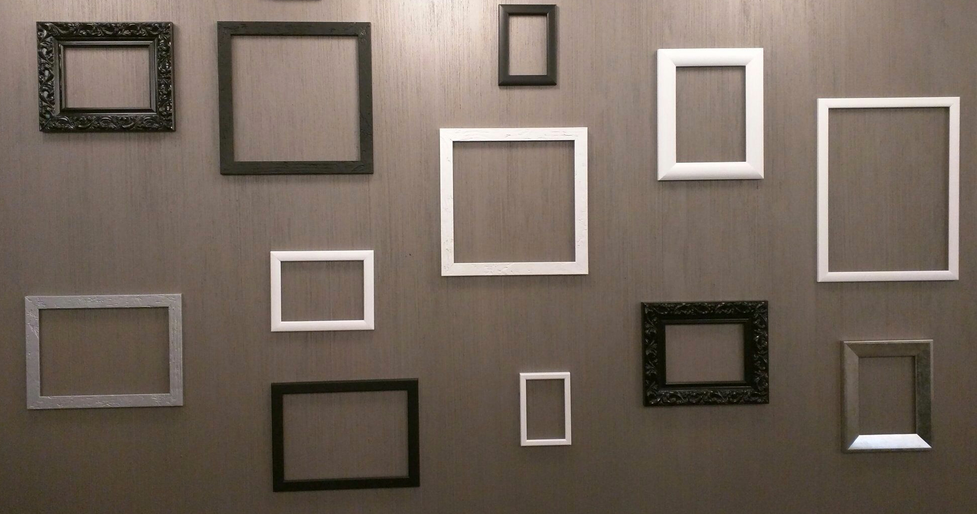 Assorted Empty Frames On A Wall